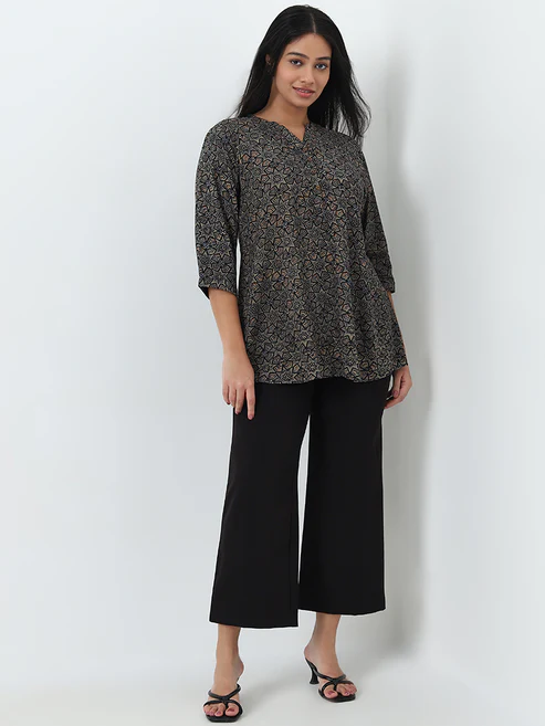 300986322BLACK_1.webp Diza Black Patterned A-Line Kurti - Image 1