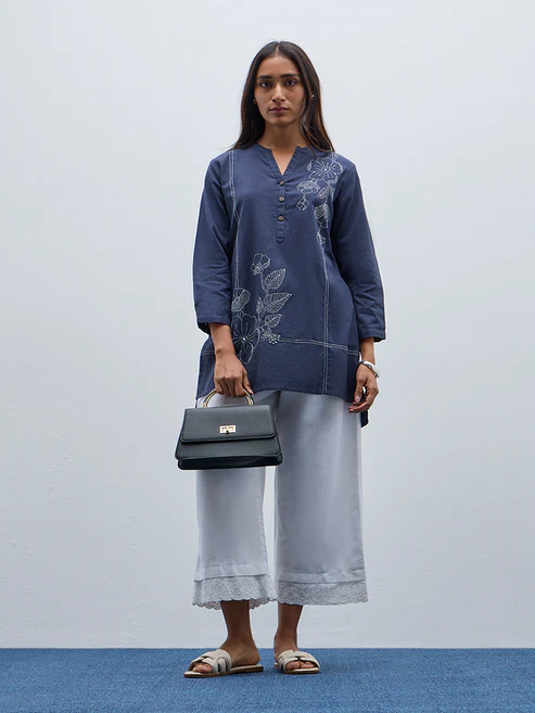 300992360INDIGO_1.webp Utsa Indigo Floral High-Low Cotton Blend Kurti - Image 1