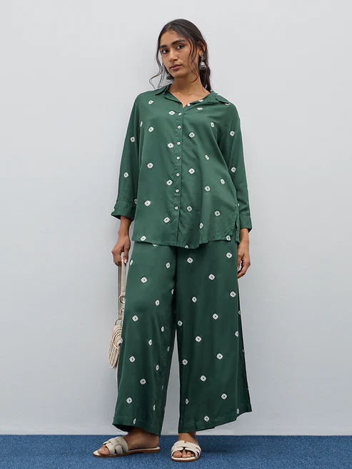 300992614GREEN_1.webp Utsa Dark Green Bandhani Printed Straight Tunic - Image 1