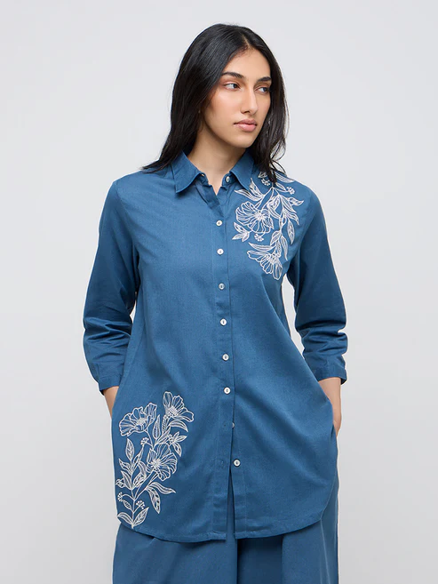 300996749INDIGO_1.webp Utsa Blue Embroidered A-Line Cotton Blend Tunic - Image 1